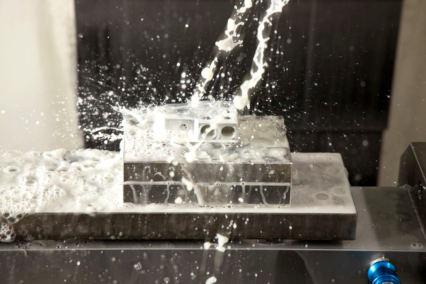 Cutting a terminal body under flood coolant